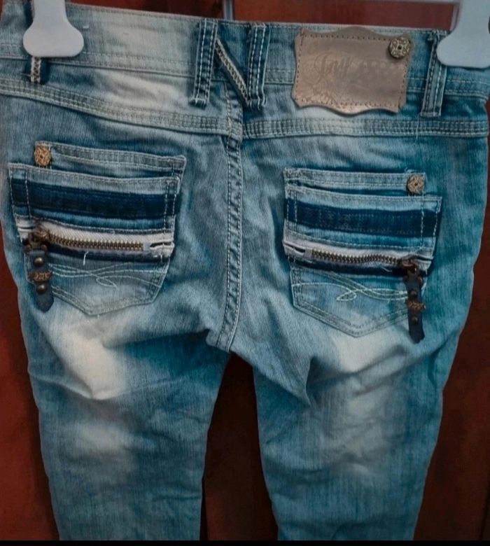 Jeans effet délavé avec troués taille 34 - photo numéro 7