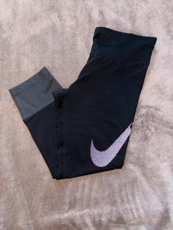 Legging de sport femme Nike taille M noir en très bon état