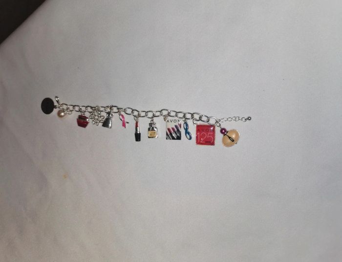 Bracelet breloques. Collector. Avon - photo numéro 3