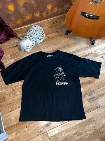 T-shirt noir pull and bear motifs Naruto très bon état M