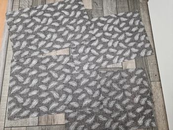 Linge de table motifs plumes