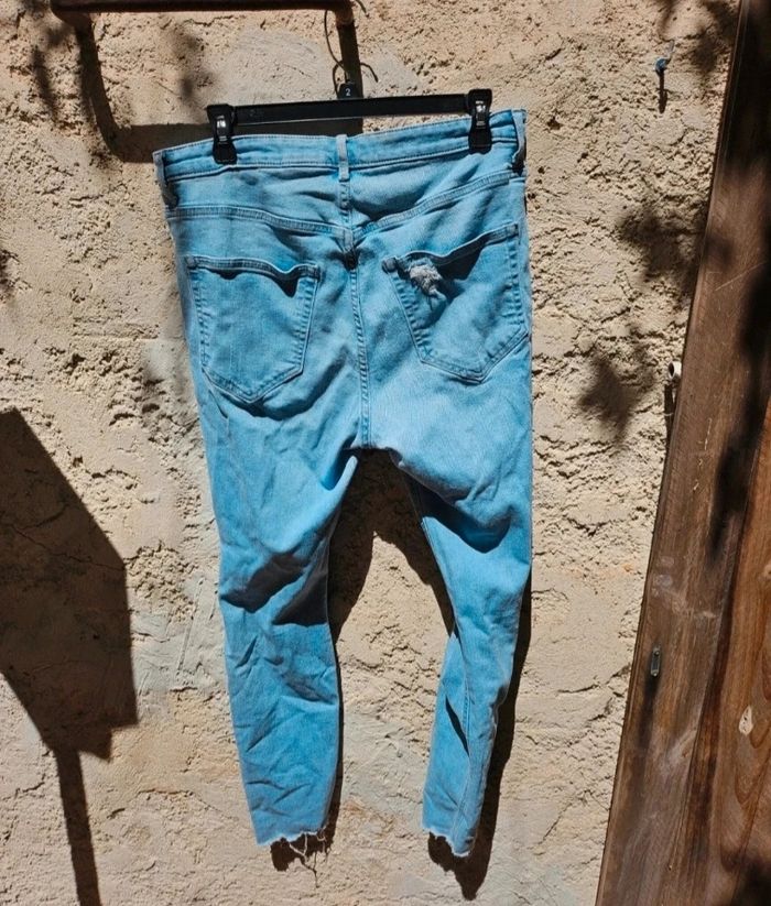 Jean skinny bleu troué - photo numéro 5