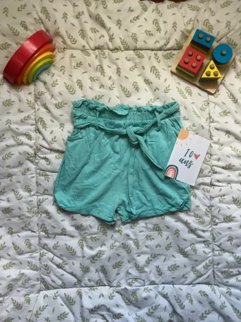 short avec ceinture turquoise influx 10 ans