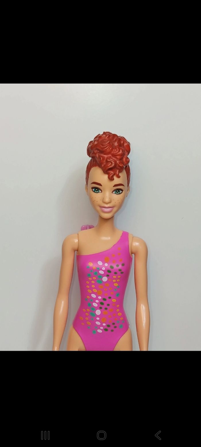 Poupée mattel barbie Color Reveal série été 7 rose gtl79
Poupée et ensemble compris - photo numéro 2