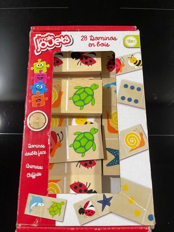 La malle aux jouets Domino en bois 18m+