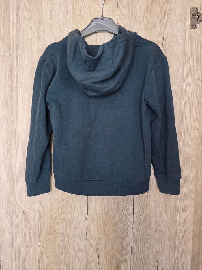 GILET À CAPUCHE GARÇON BLEU AVEC POCHES SUR LES CÔTÉS TAILLE 8ANS MARQUE NPO - photo numéro 2
