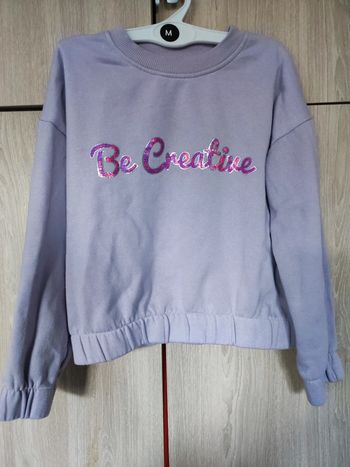 Pull lilas inscription strass 8 ans
