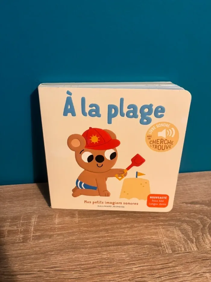 Livre sonore avec un cherche et trouve à la plage