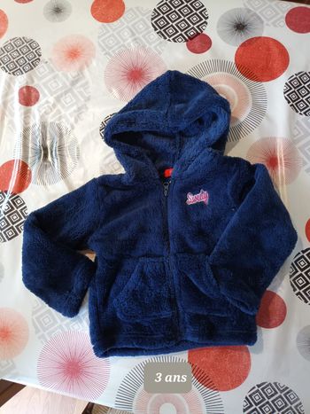 Veste poilue comme Neuve taille 3 ans