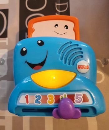 Jouet musical mon 1er grille pain rire et éveil de Fisher Price