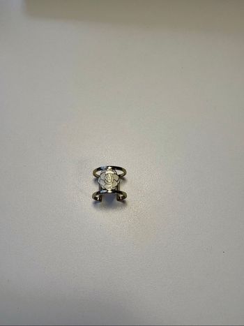 Bague ajustable dorée avec motif floral
