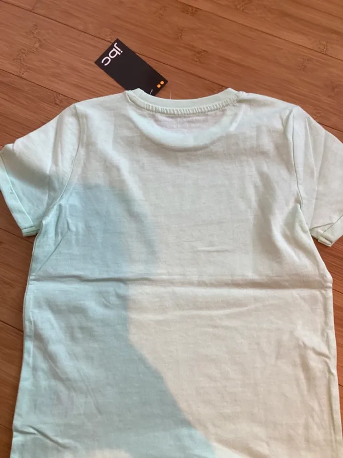 7 ans - T-shirt manches courtes couleur vert eau - neuf - inscription Vedette - photo numéro 4