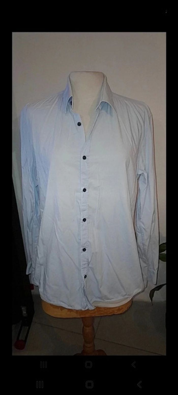 Chemise bleu stretch taille l de chez WE