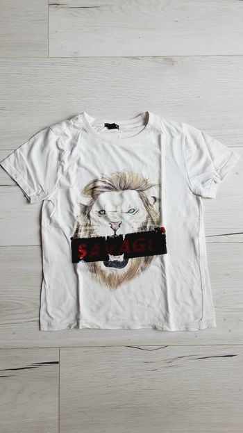 Vêtement garçon tee-shirt manches courtes blanc lion à sequins Kiabi 6 ans
