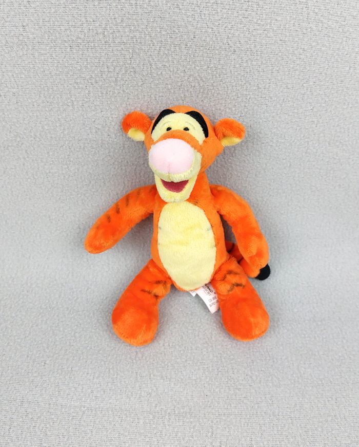 Peluche doudou Tigrou DISNEYLAND PARIS 22 cm billes corps