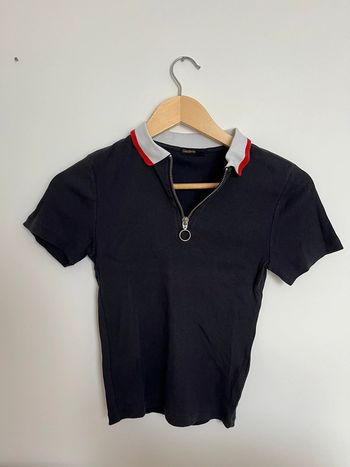 polo à fermeture