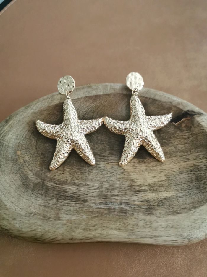 Boucles d'oreilles étoiles de mer dorées
