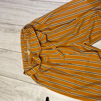 Pantalon jambes larges à rayures