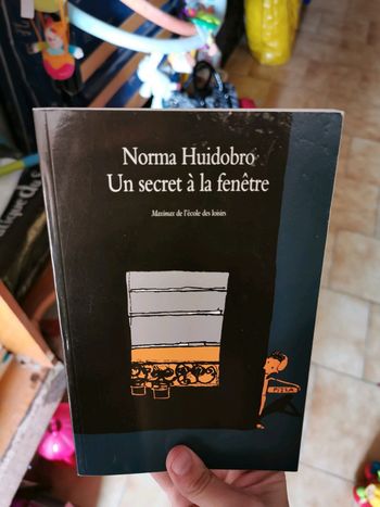 Un secret à la fenêtre
