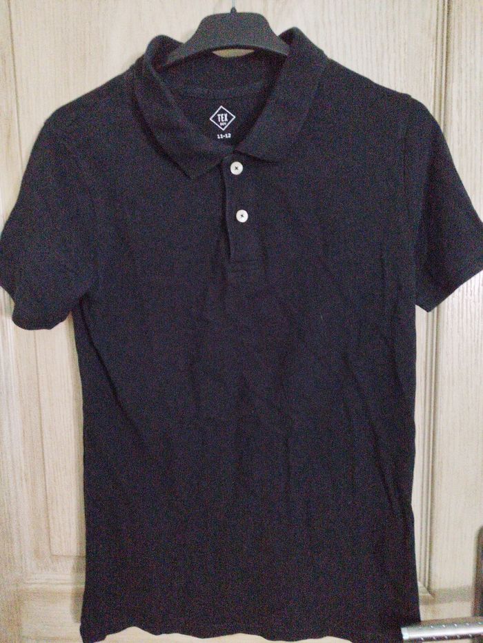 Polo noir 11-12 ans