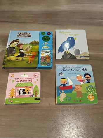 Lot de 4 livres dont 3 sonores histoires Winnie Disney et musique piles à changer