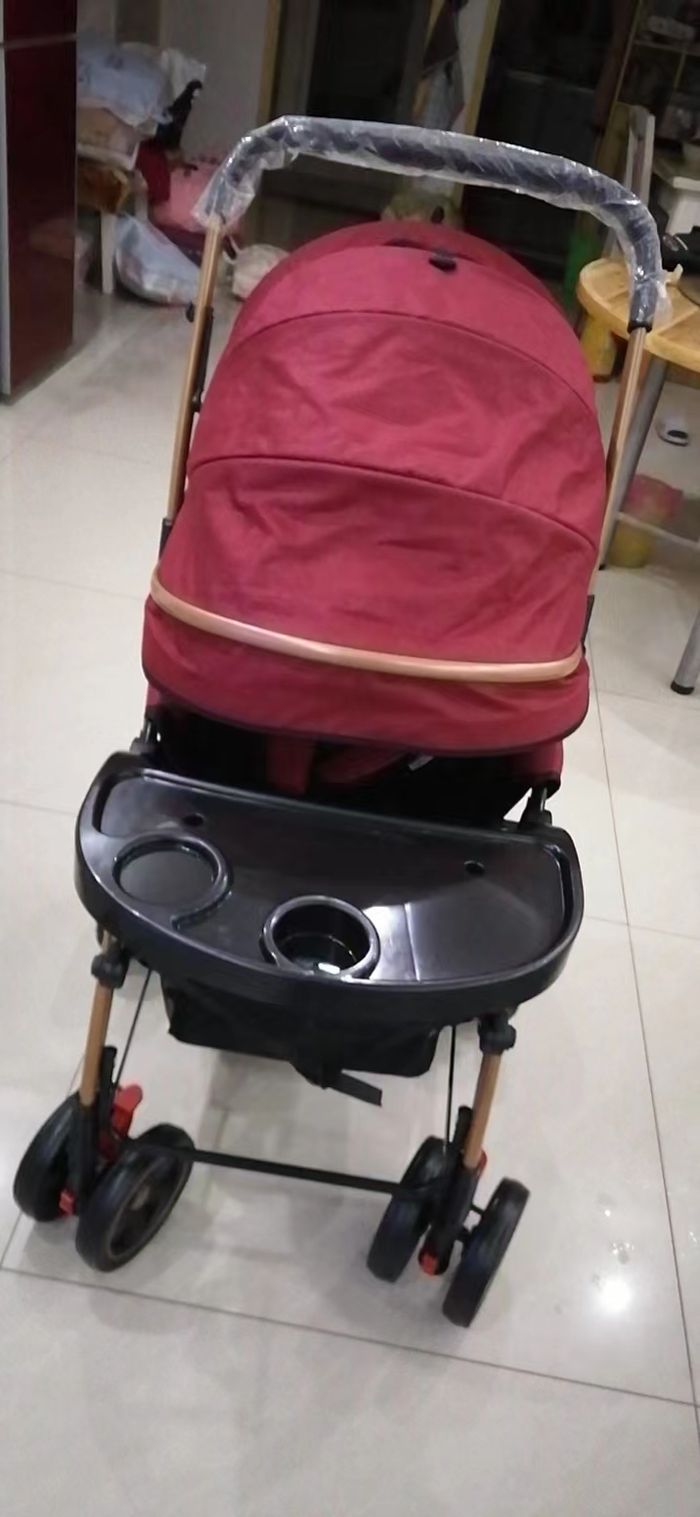 Poussette qui peut être pliée