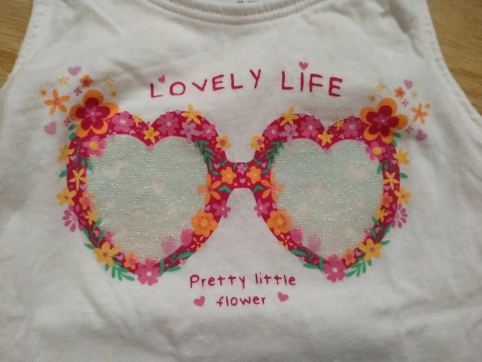 Débardeur blanc. Lunettes a paillettes. Filles. Kiabi
Taille 4 ans - photo numéro 3