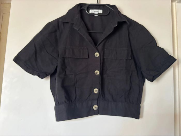Chemise courte sans manches