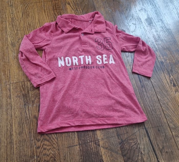 polo manche longue rouge garçon tex taille 5/6ans