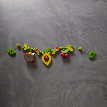 Jouet en bois pour se mettre sur les poussettes ou autre