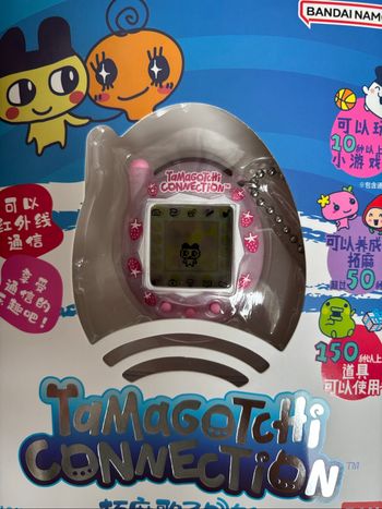 Tamagotchi connection rose lait fraises neuf