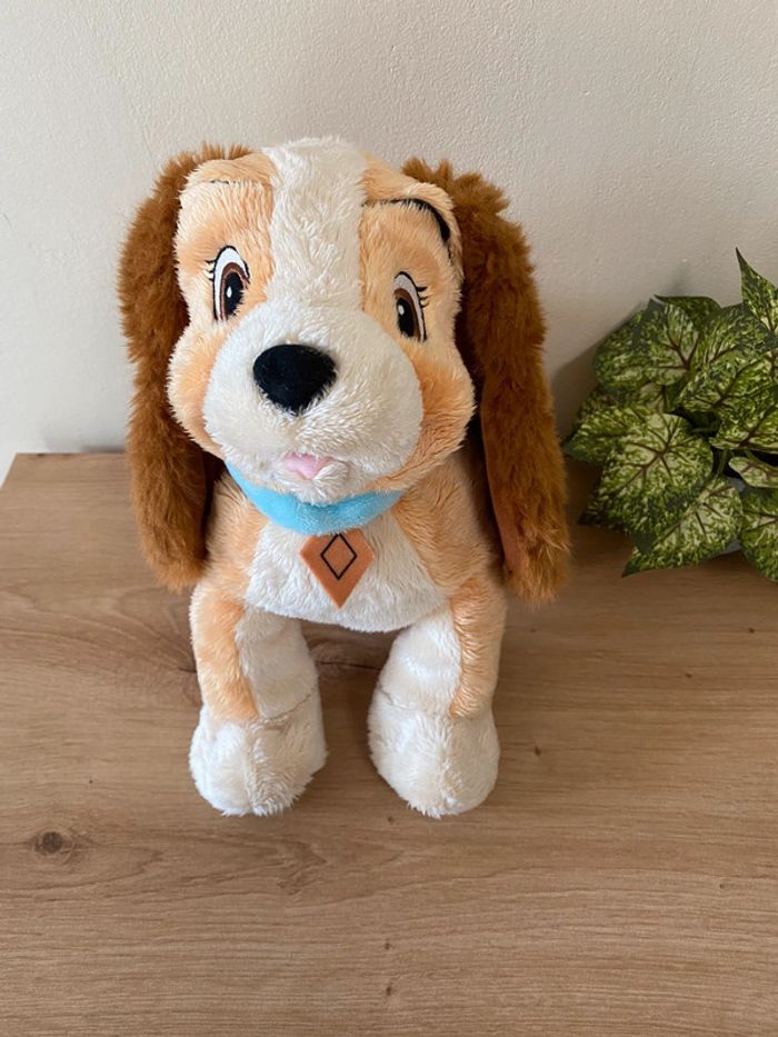 Doudou peluche chien lady la belle et le clochard collier bleu Disney nicotoy