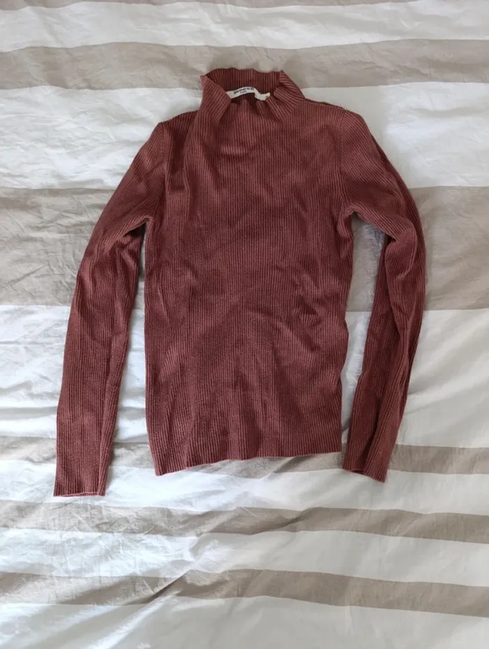 Pull col roulé