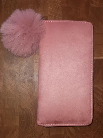 Porte feuille.