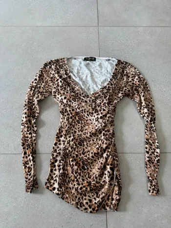 Haut marron et noir Enzoria, très bon état, taille unique