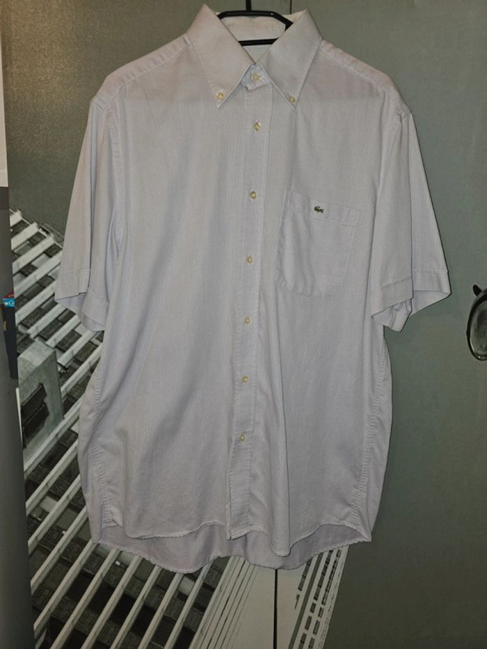 Joli chemise Lacoste taille 42