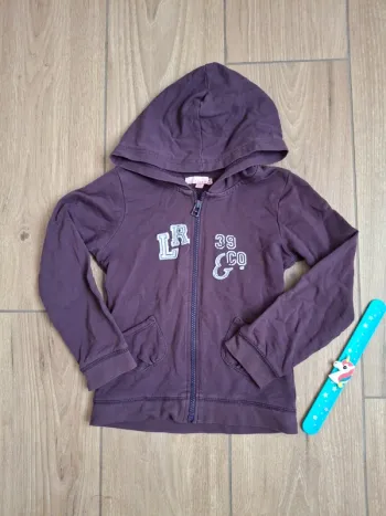Sweat à capuche zippé Lisa rose 6 ans très bon état