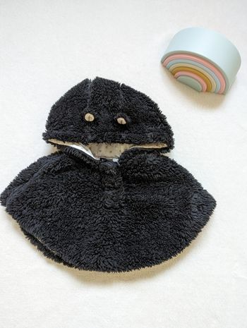 Poncho noir à paillettes