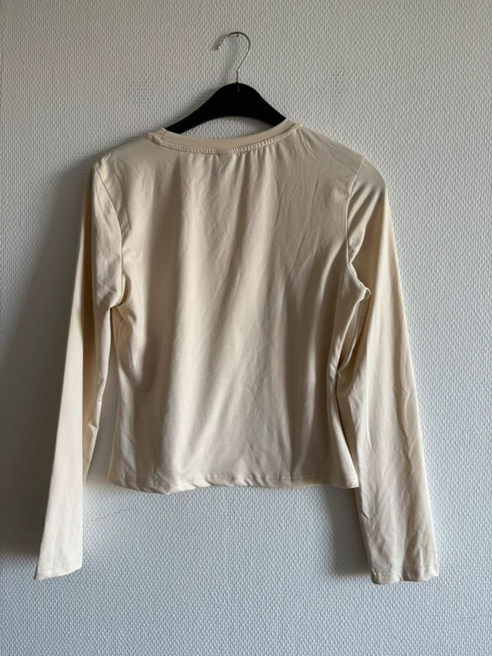 Manche longue beige - photo numéro 3