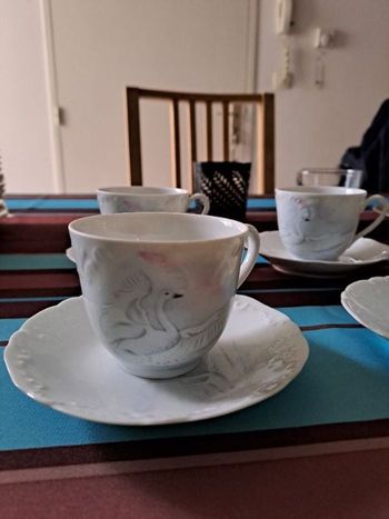 4 tasses et sous tasses porcelaine tharaud