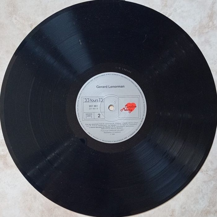 Vends Vinyle Gérard Lenorman vitesse 33 tours format 30 cm 11 titres Album le soleil des tropiques - photo numéro 4