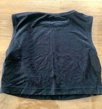 Top court noir taille XS en tbe à 3 euros