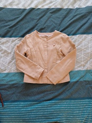 Veste 12 ans tape à l'œil très bon état