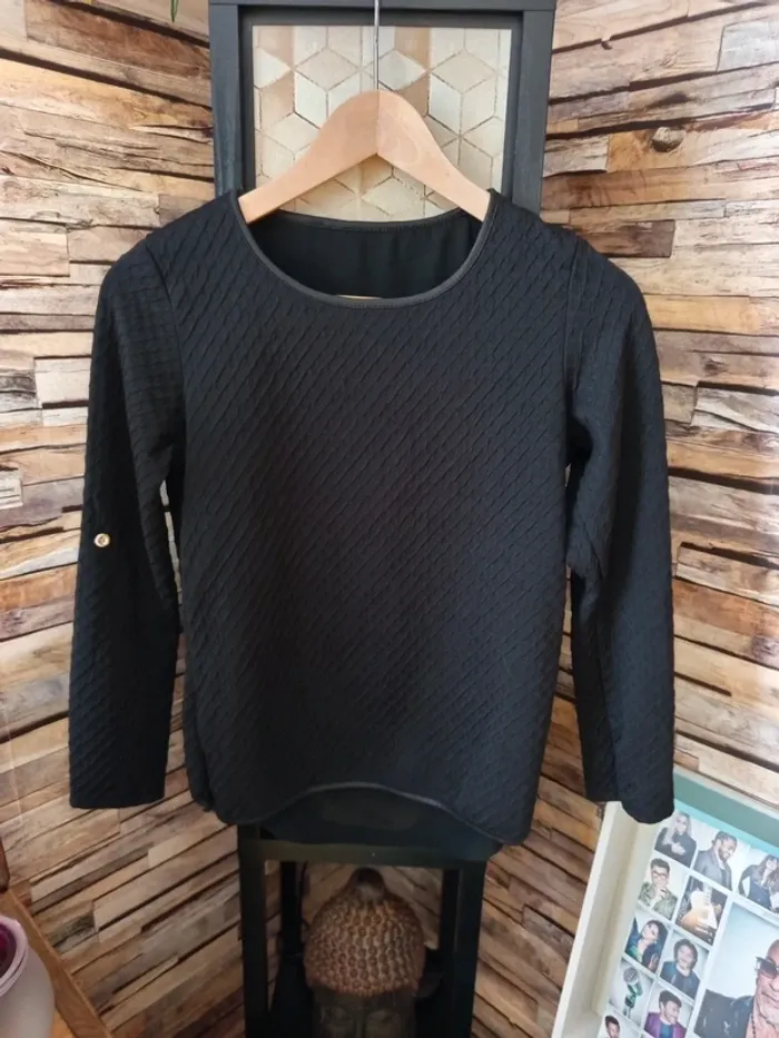 Pull à noeud dans le dos