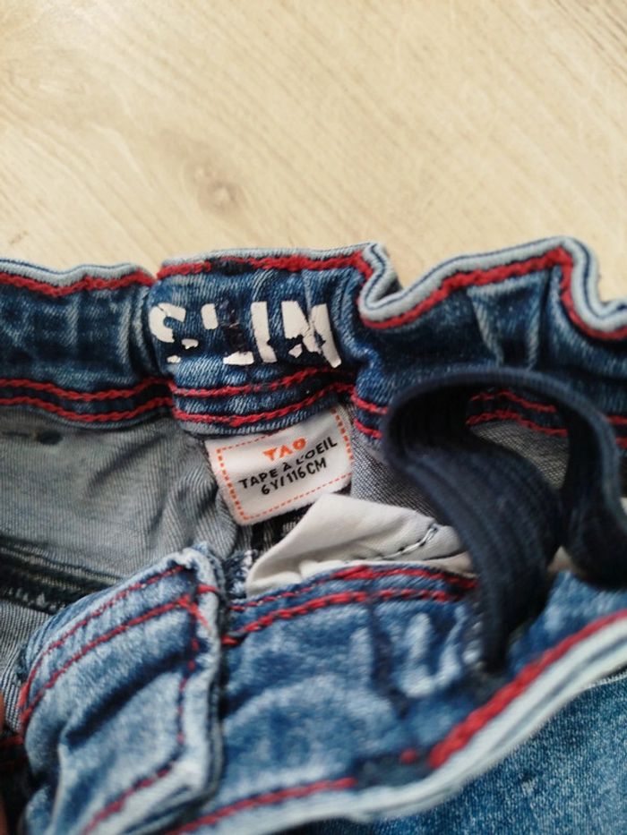 Jean taille 6 tape à l'oeil effet déchiré - photo numéro 3