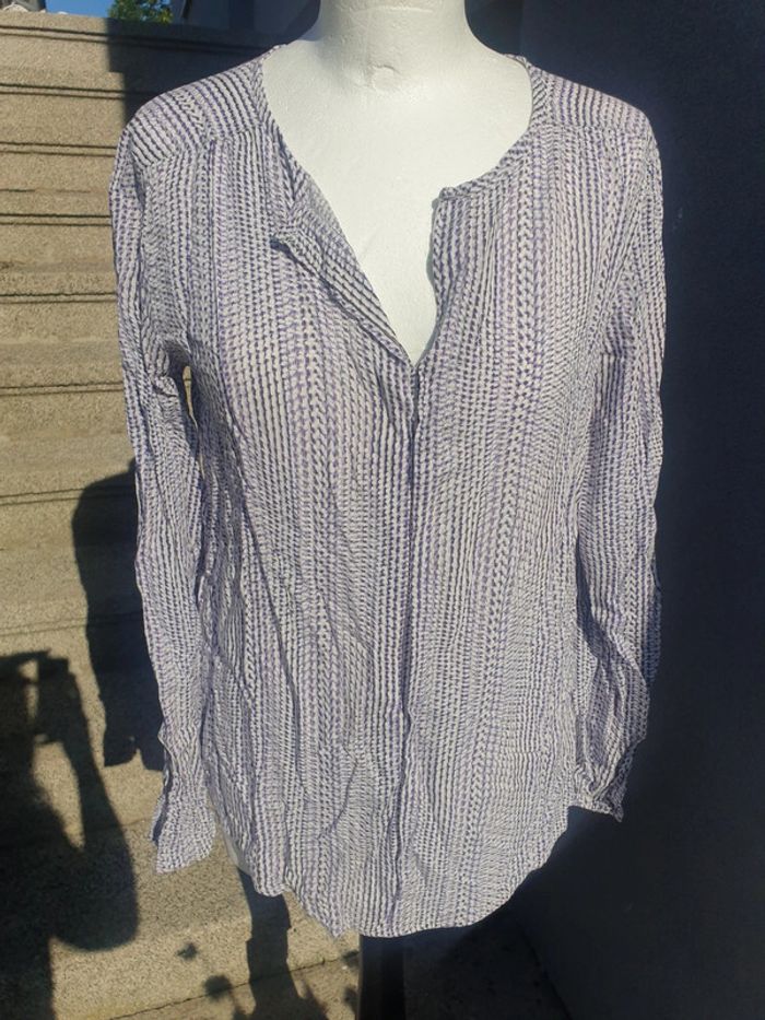 Blouse cartoon 
Sans étiquette mais correspond a un 38
