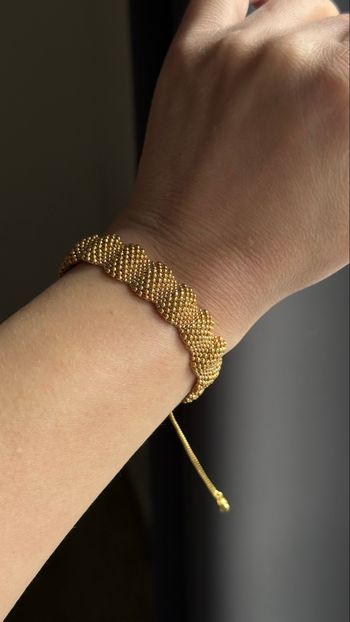 Bracelet vague doré avec chaînette d’extension