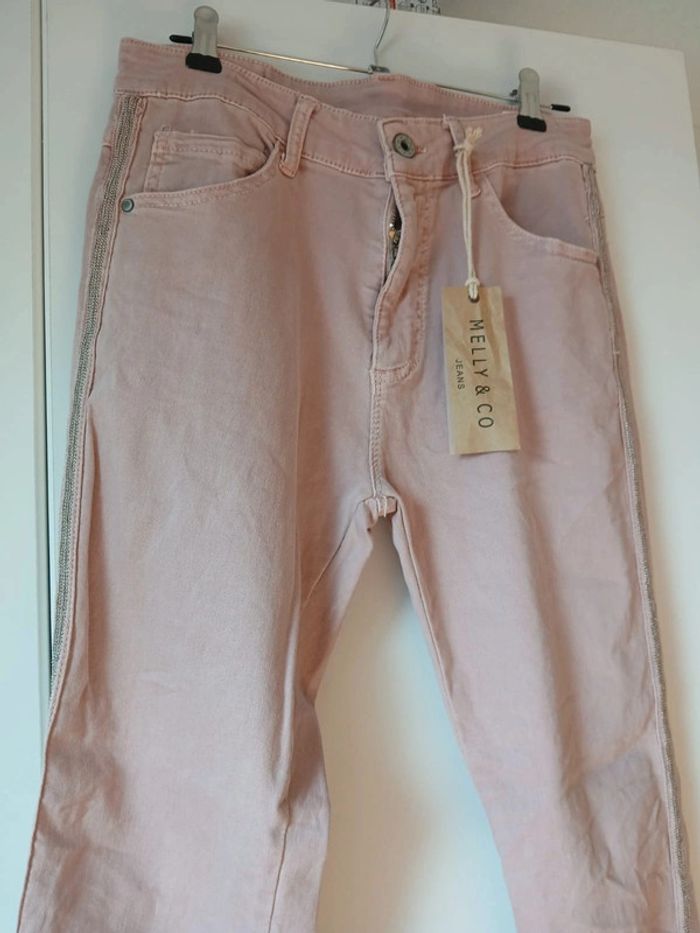 Pantalon rose pâle neuf avec étiquette de chez melly and co