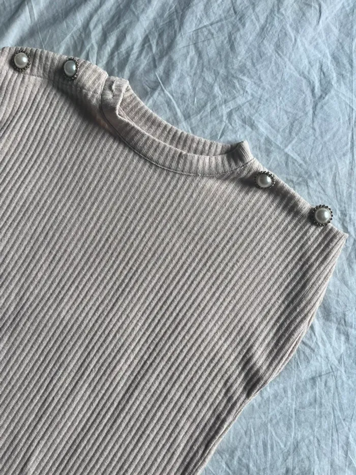 Haut à bouton