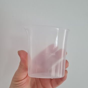 Verre doseur pour fer